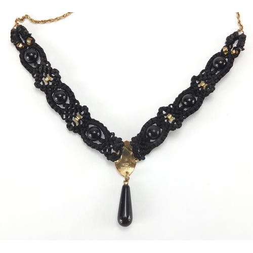 2707 - 9ct gold black jet and cord necklace, 44cm in length, approximate weight 6.4g