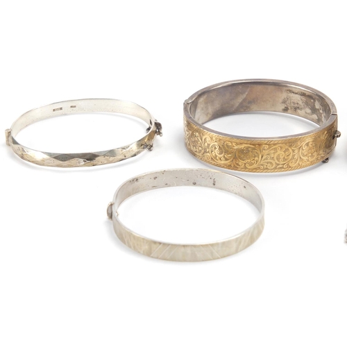 2697 - Six silver bangles and bracelets, some with chased and engine turned decoration, approximate weight ... 