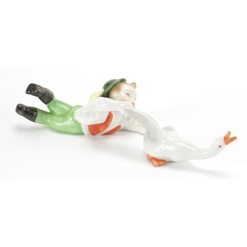 2450 - Herend of Hungary hand painted model of a boy with a goose, 19.5cm wide