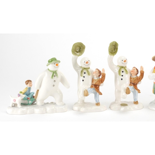 2466 - Seven John Beswick snowman figures, The Snowman and The Snowdog , the largest 14.5cm high