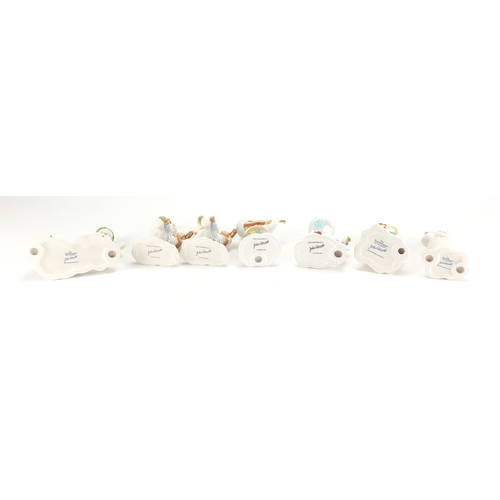 2466 - Seven John Beswick snowman figures, The Snowman and The Snowdog , the largest 14.5cm high