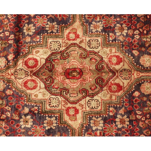 2022 - Rectangular Hamadan rug, having an all over stylised repeat floral within corresponding borders, ont... 