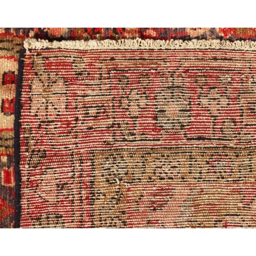 2022 - Rectangular Hamadan rug, having an all over stylised repeat floral within corresponding borders, ont... 