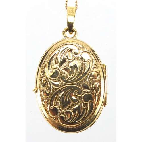 2712 - 9ct gold locket with floral chased decoration, on a 9ct gold necklace, the locket 3cm in length, app... 