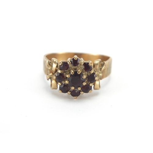 2688 - 9ct gold garnet cluster ring, size U, approximate weight 5.4g