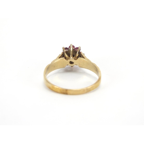 2696 - 9ct gold diamond and pink stone flower head ring, size Q, approximate weight 2.8g