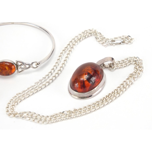 2709 - Silver and amber jewellery including two pendants, bracelet, ring and two pairs of earrings, approxi... 