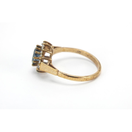 2750 - 9ct gold blue and clear stone ring, size N, approximate weight 2.2g