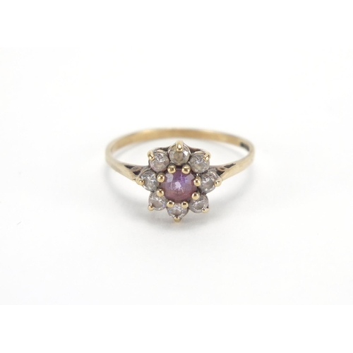 2621 - 9ct gold pink and clear stone flower head ring, size L, approximate weight 1.3g