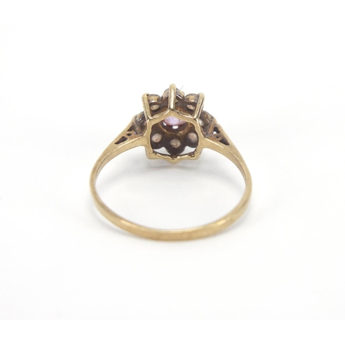 2621 - 9ct gold pink and clear stone flower head ring, size L, approximate weight 1.3g