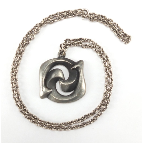 2732 - Norwegian pewter pendant, by Eivind Hillestad, approximately 3.2cm in diameter