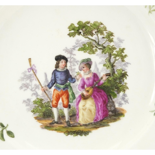 2238 - Meissen porcelain plate, hand pained with two lovers and flowers within a gilt border, blue cross sw... 