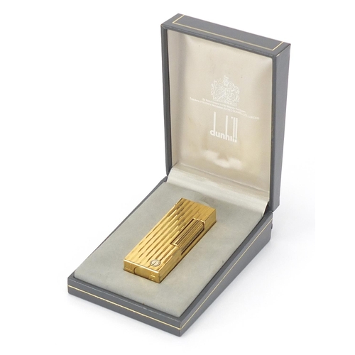 2516 - Gold plated Dunhill pocket lighter, with fitted case and box, 6.5cm high