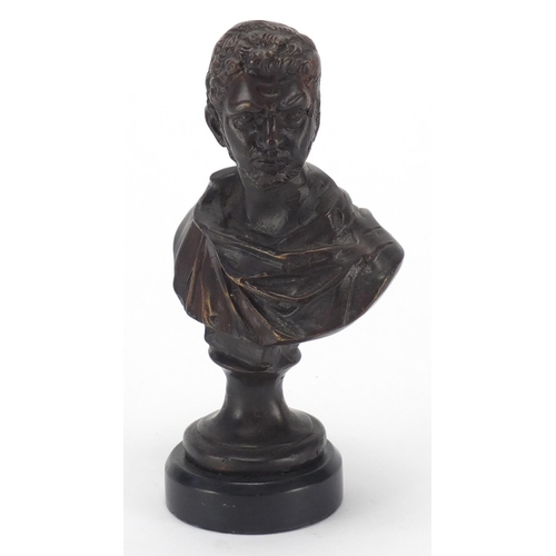 2182 - Patinated bronze bust of a classical gentleman on circular black marble style base, 16cm high