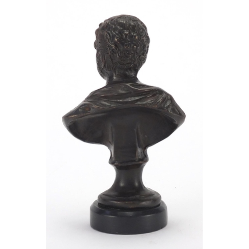 2182 - Patinated bronze bust of a classical gentleman on circular black marble style base, 16cm high