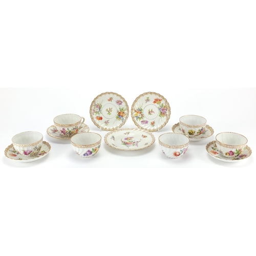 2202 - Dresden fluted teaware hand painted with flowers, including trio's, the cups 5cm high