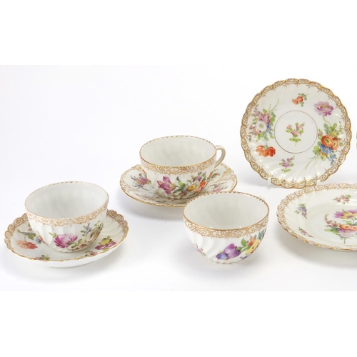 2202 - Dresden fluted teaware hand painted with flowers, including trio's, the cups 5cm high