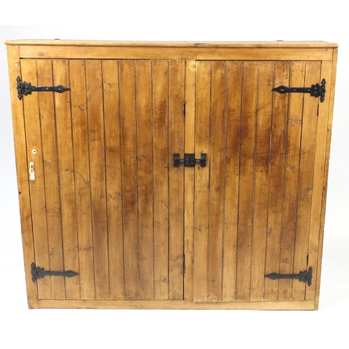 42 - Antique pine two door hall cupboard, 131cm H x 145cm W x 33.5cm D