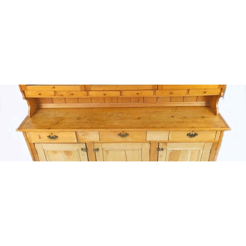 34 - Pine dresser fitted with a series of glazed doors above cupboards doors and drawers, 197cm H x 197cm... 