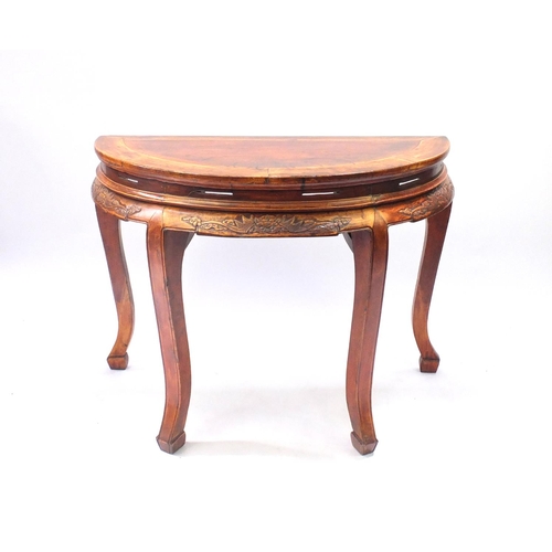 50 - Chinese hardwood Demilune side table, carved with dragon heads, 87cm high x 122cm W x 58cm D
