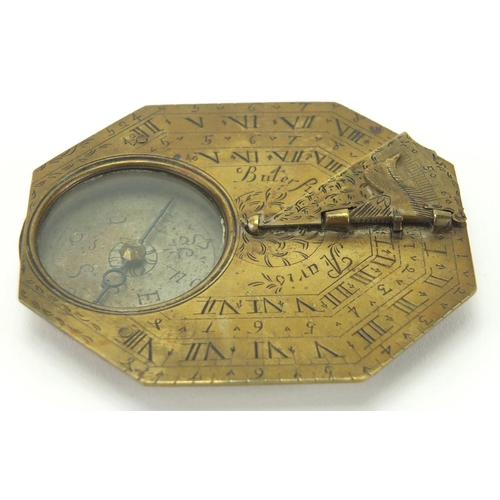 112 - Late 17th/early 18th century French engraved brass compass sundial by Michael Butterfield, with fitt... 