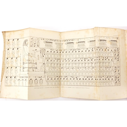 176 - Three 19th century hardback books comprising Discoveries in the Ruins of Nineveh and Babylon with pu... 