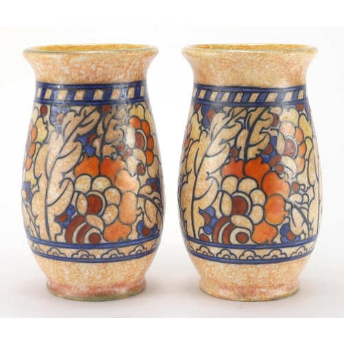 807 - Pair of Crown Ducal pottery vases by Charlotte Rhead, hand painted and tube lined with stylised flow... 