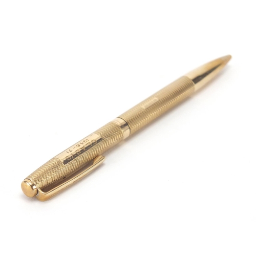 121 - 9ct gold Yard-O-Led ball point pen, with engine turned body and fitted case, approximate weight 28.6... 