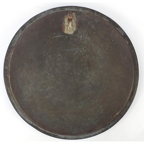 582 - Large Islamic brass tray, engraved with script and floral motifs, 62.5cm in diameter