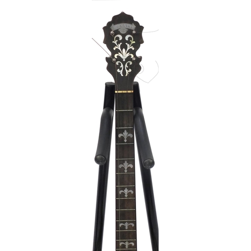 133 - Vintage Langstile banjo with mother of Pearl inlay and fitted carrying case, 79cm in length