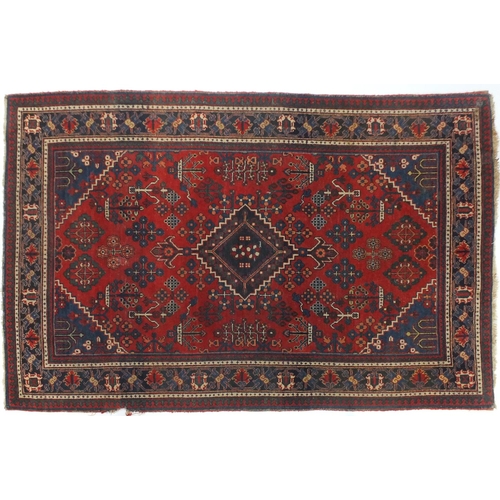 646 - Persian Joshagan rug with central medallion onto a red ground, 200cm x 132cm