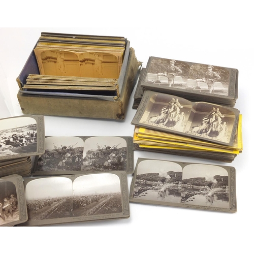 184 - Stereo view cards including World War I and Italy examples, some titled troops and supplies being ru... 