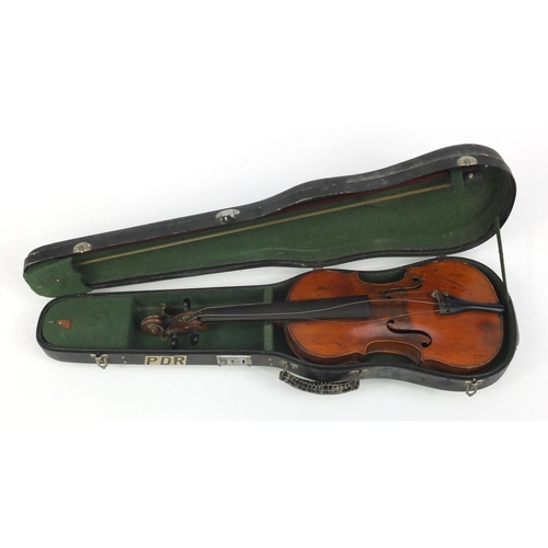 131 - Old wooden violin with scrolled neck, bow and fitted carrying case, the violin back 15 inches in len... 