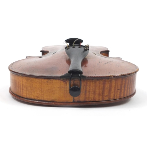 131 - Old wooden violin with scrolled neck, bow and fitted carrying case, the violin back 15 inches in len... 