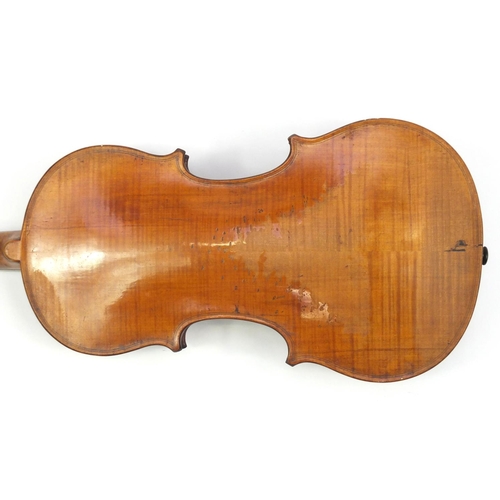 131 - Old wooden violin with scrolled neck, bow and fitted carrying case, the violin back 15 inches in len... 