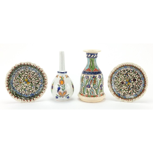 599 - Turkish Kütahya pottery, hand painted with stylised flowers comprising rose water vase, Hooka Base a... 