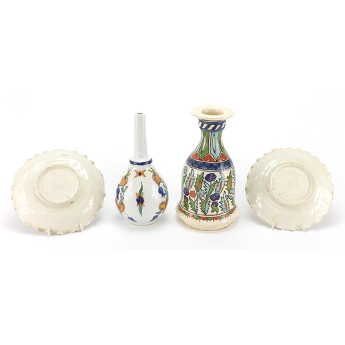 599 - Turkish Kütahya pottery, hand painted with stylised flowers comprising rose water vase, Hooka Base a... 