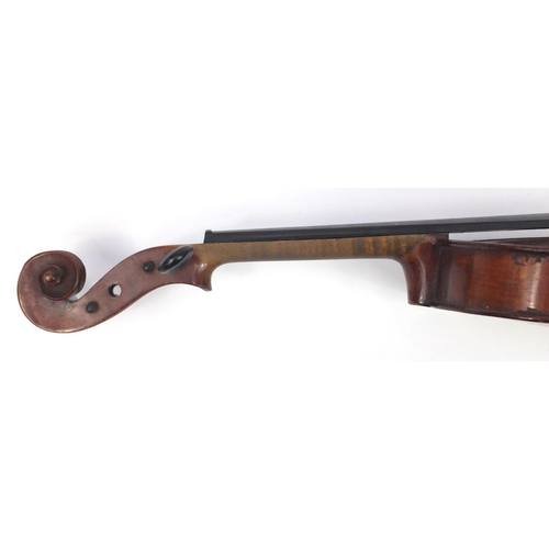 132 - Old wooden violin with scrolled neck, bearing a De Giovanni Paolo Grancinero label, with bow and pro... 