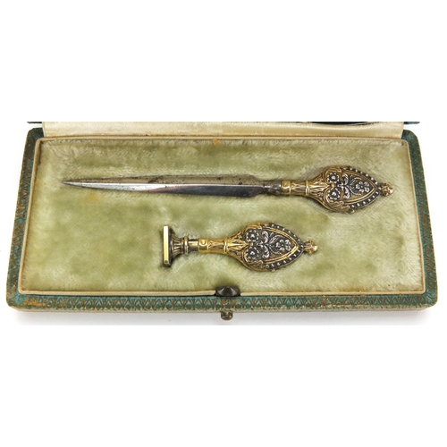 44 - French letter opener and desk seal with silver gilt handles, housed in a velvet and silk lined A Big... 