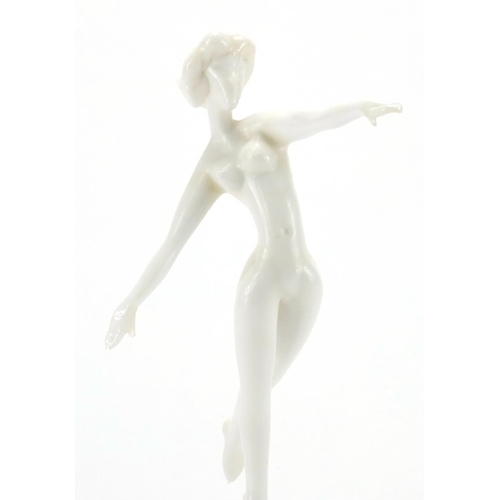 785 - Istvan Komaromy glass figurine of a nude dancer balanced upon a spherical base, 18.5cm high