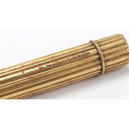 120 - Samuel Mordan & Co unmarked gold propelling pencil, 9cm in length when closed, approximate weight 14... 