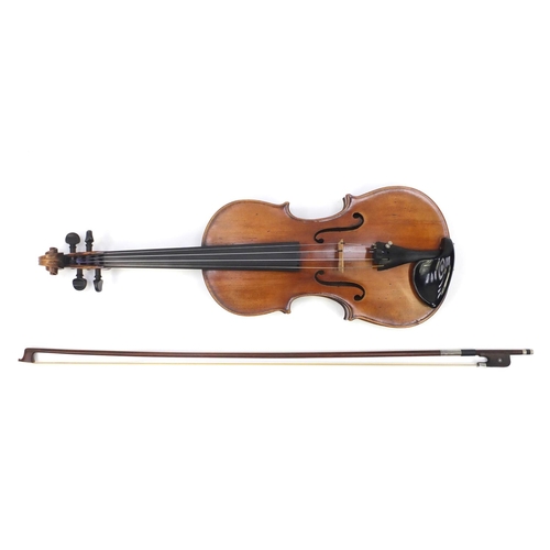 130 - Old wooden violin with one piece back and scrolled neck, stamped Duke London, with two bows and prot... 