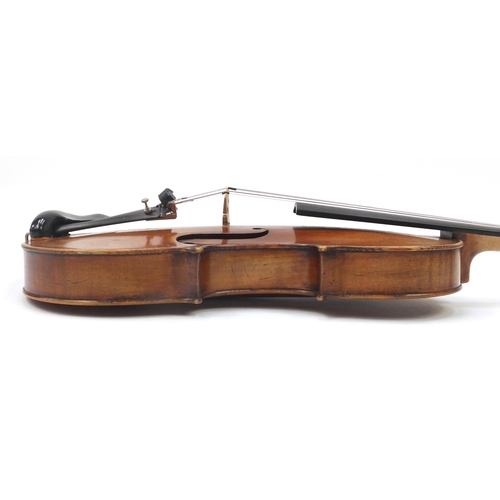 130 - Old wooden violin with one piece back and scrolled neck, stamped Duke London, with two bows and prot... 