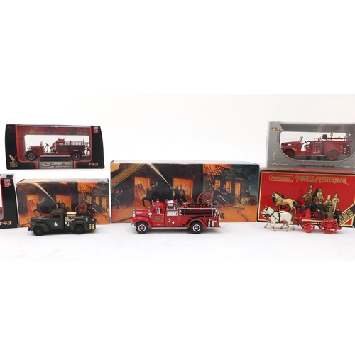 688 - Seven die cast fire engines, all boxed, Matchbox, models of Yesteryear and Signature series