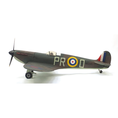 2103 - Large scratch built hand painted model of a spitfire, 180cm wide x 142cm deep