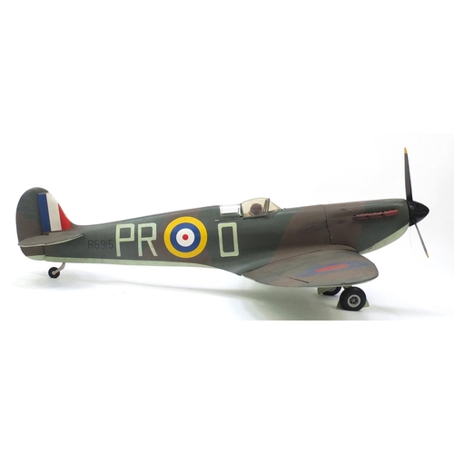 2103 - Large scratch built hand painted model of a spitfire, 180cm wide x 142cm deep