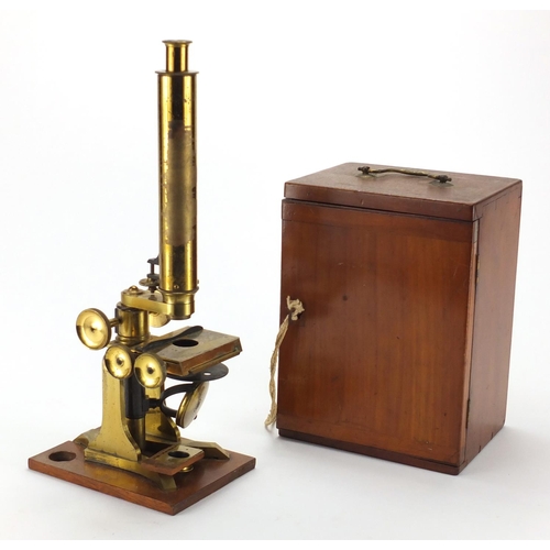 114 - 19th century adjsutable brass microscope with lenses and mahogany carrying case, by Stanley, Railway... 