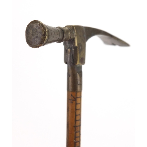 21 - Novelty ruler design brass hammer, 13cm high