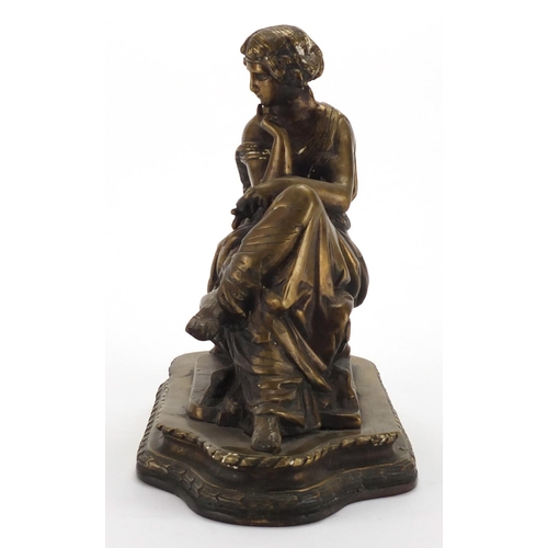 49 - Patinated bronze study of a seated female seated in classical dress, on shaped base, 29cm high