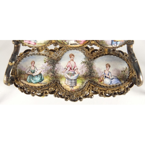 22 - Silver gilt dolls house furniture hand painted with figures in 18th century dress, including a table... 